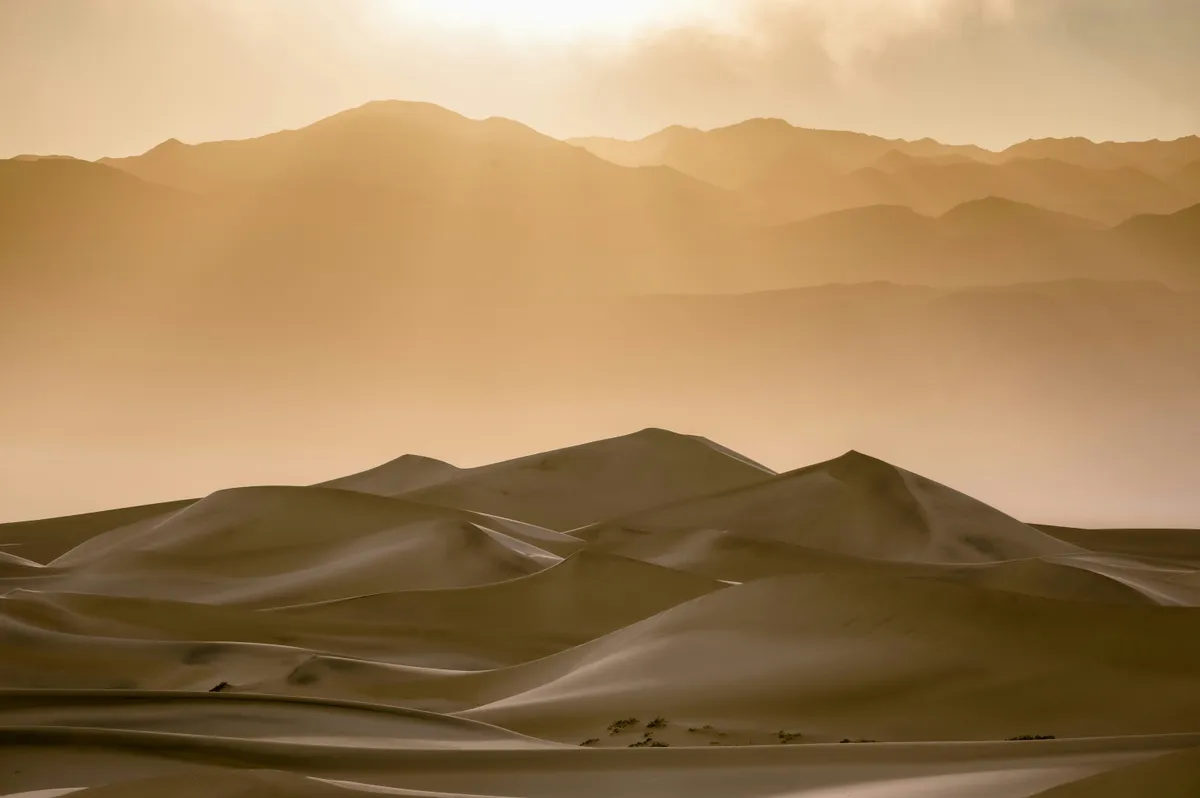 Sand Dunes against mountains