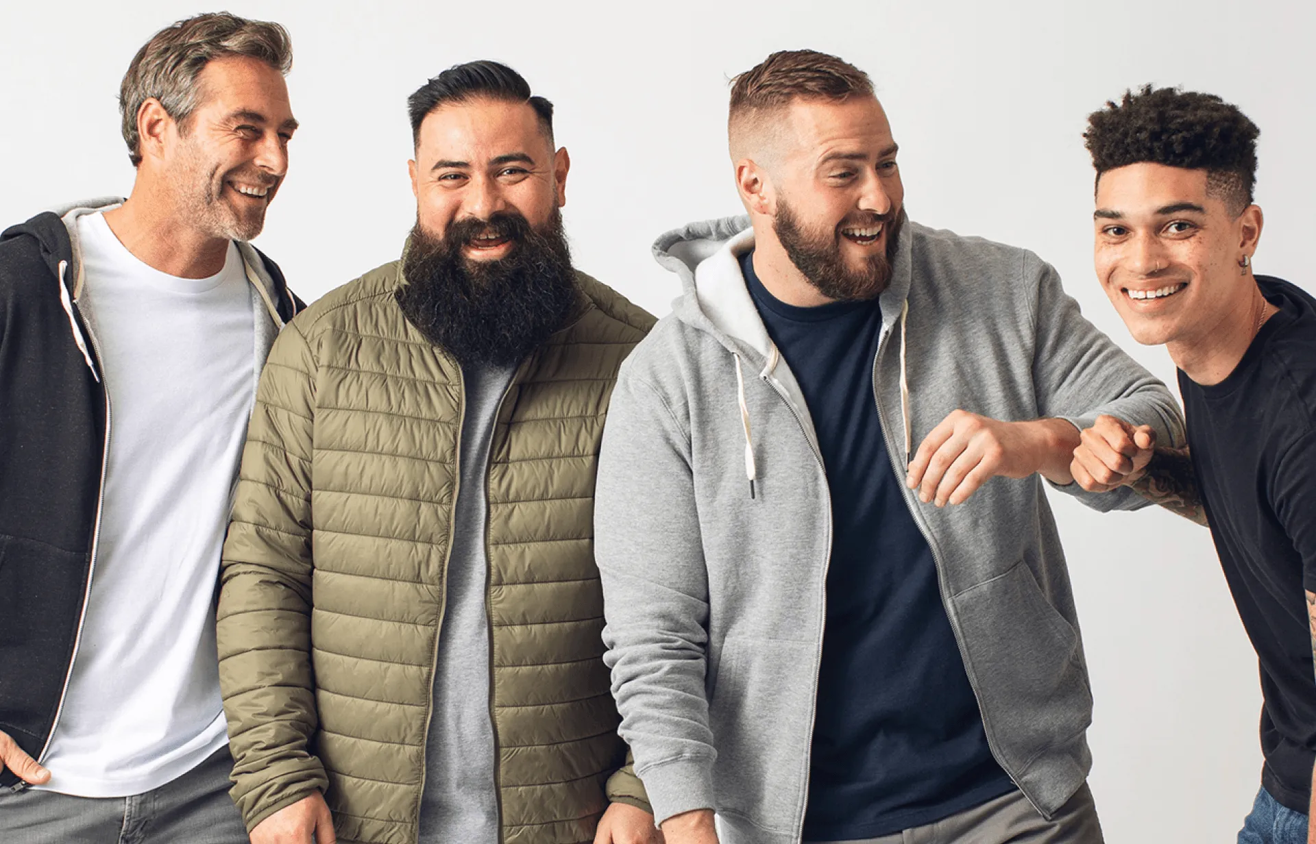 A group of men posing together for a photo.